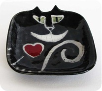 Cheshire cat plate smiling black stoneware clay square